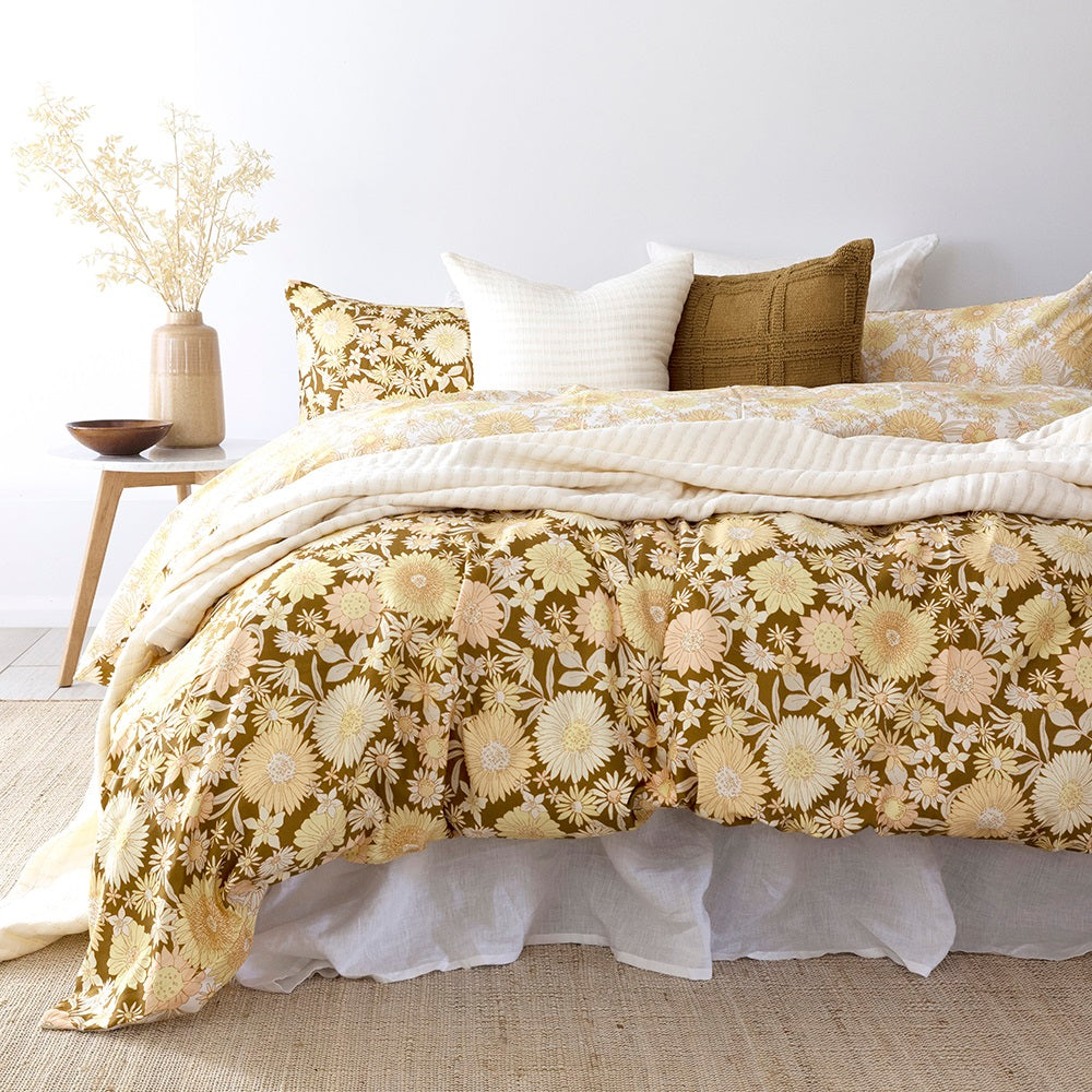 Bambury's Daphne classic sunflower patterned cotton quilt cover set with neutral throw blanket and brown decor cushions