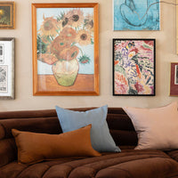 Bambury's Eva Square Cushion in Blue with linen cushions on a corner sofa